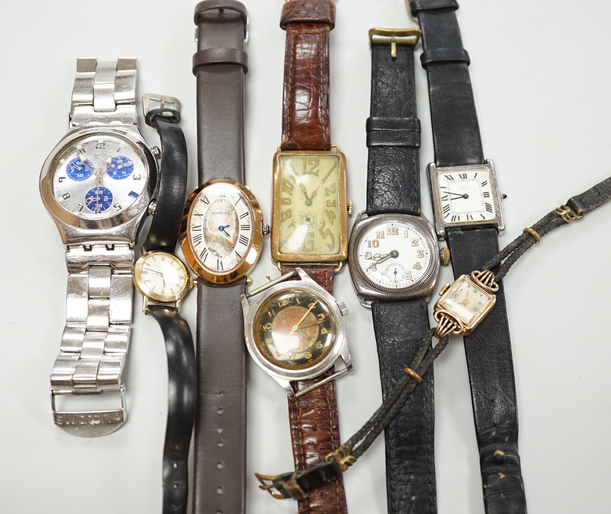 Five gentleman's assorted wrist watches including Swatch and early 20th century white metal and two lady's wrist watches.
